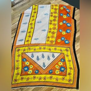 Beautiful large scarf/wrap piece, very colorful.